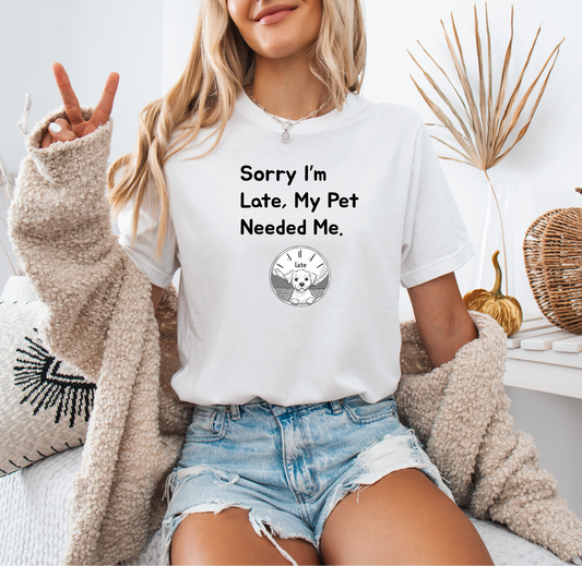 a woman sitting on a bed wearing a white shirt that says sorry i'm